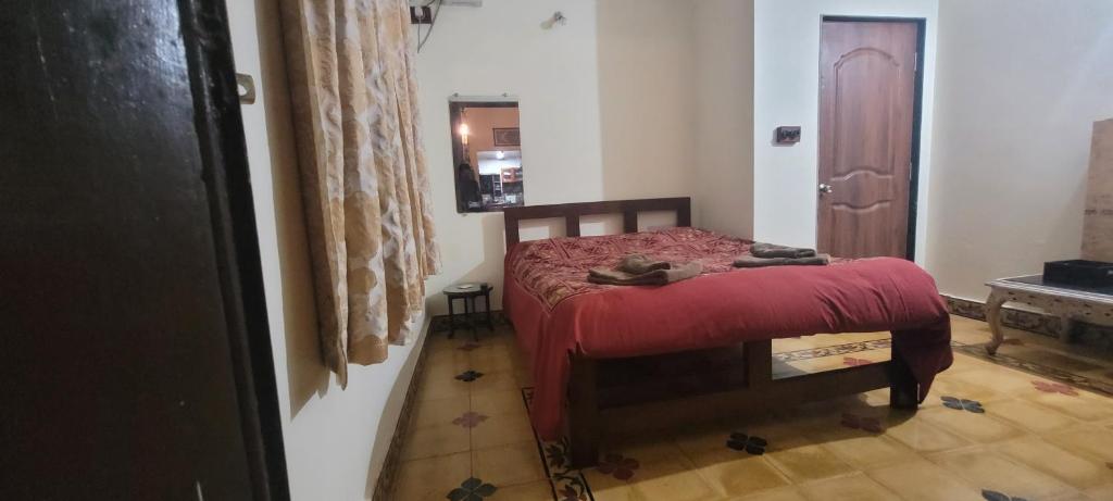 Postel nebo postele na pokoji v ubytování Villa Agastya