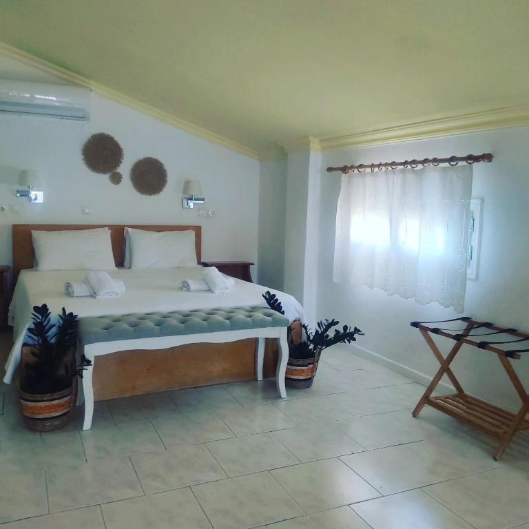 Postel nebo postele na pokoji v ubytování Anastasia Hotel