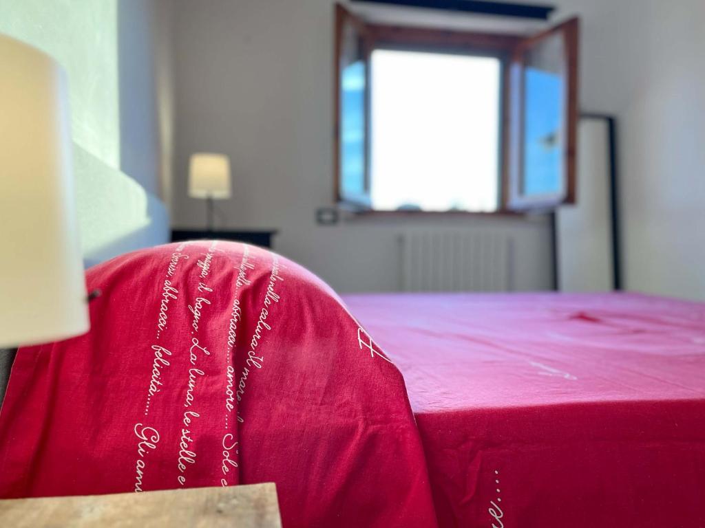 Postel nebo postele na pokoji v ubytování Casa Vacanze Azzurra