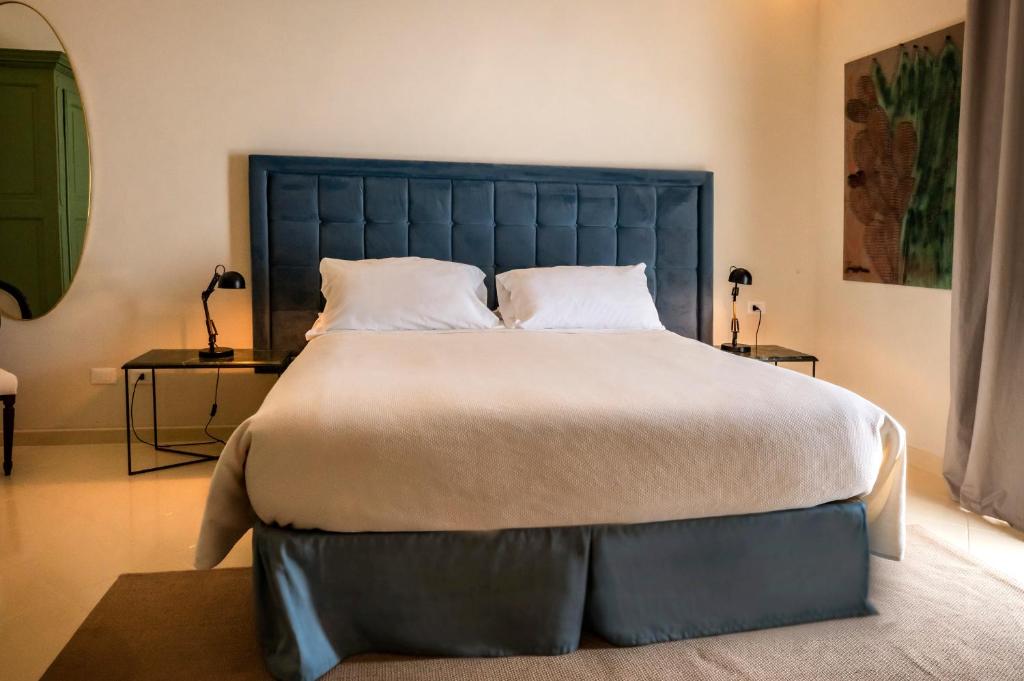 Postel nebo postele na pokoji v ubytování Aria Rooms and Terrace