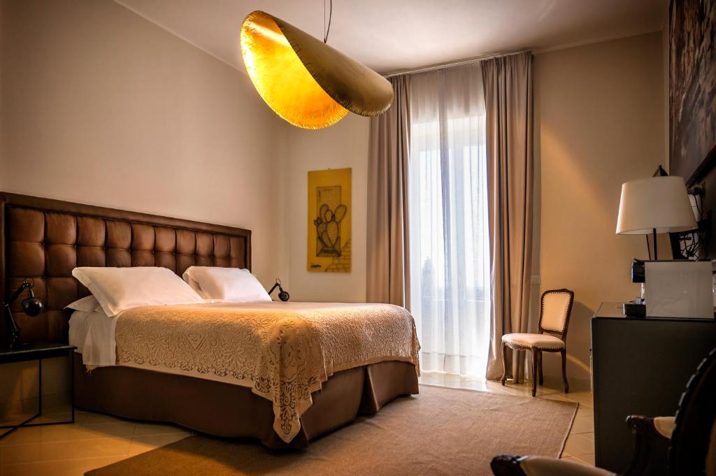 Postel nebo postele na pokoji v ubytování Aria Rooms and Terrace
