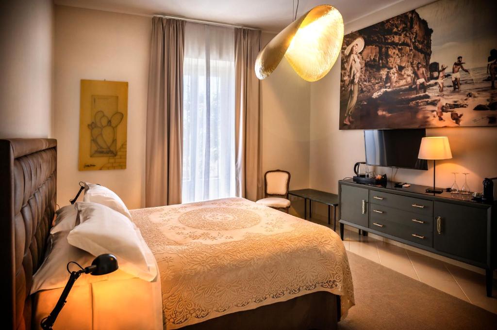 Postel nebo postele na pokoji v ubytování Aria Rooms and Terrace