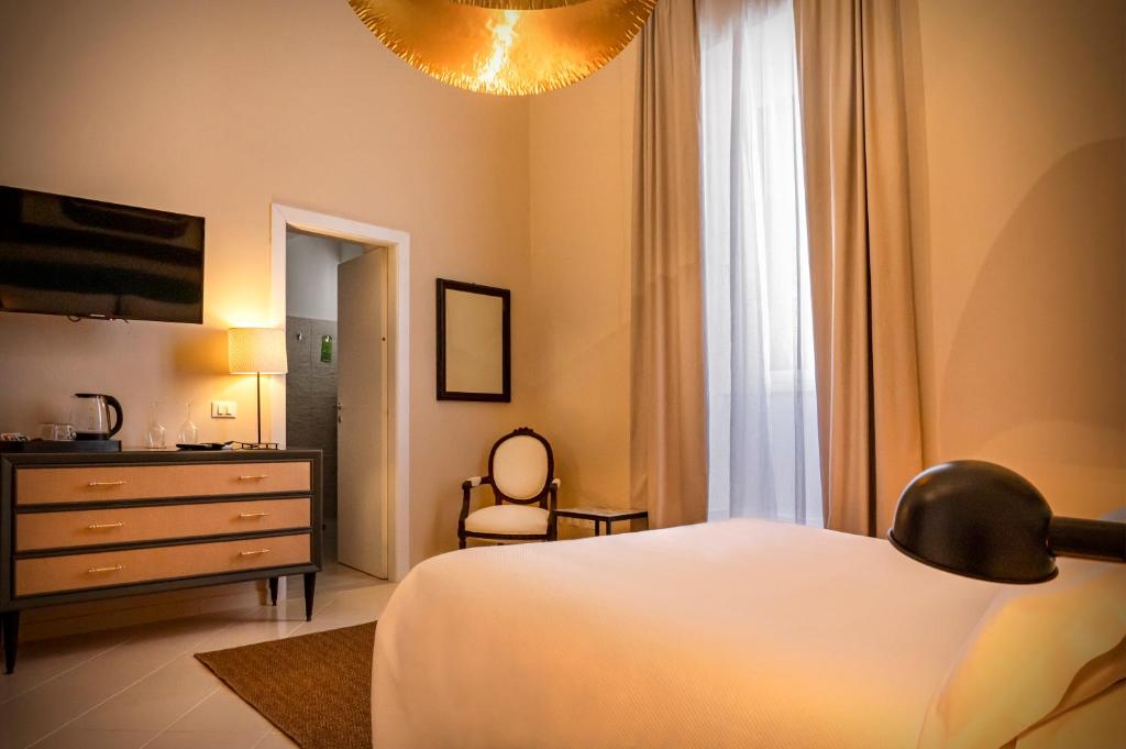 Postel nebo postele na pokoji v ubytování Aria Rooms and Terrace