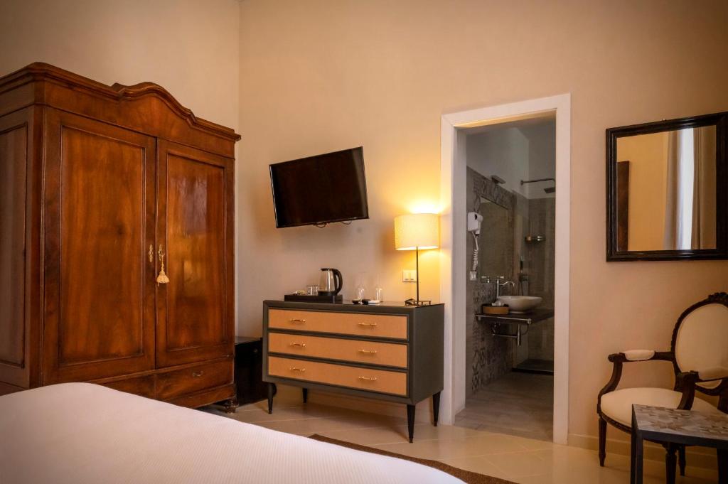 Postel nebo postele na pokoji v ubytování Aria Rooms and Terrace