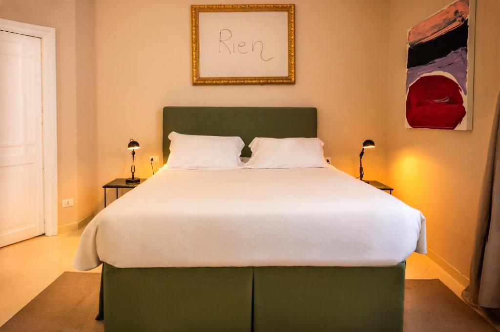 Postel nebo postele na pokoji v ubytování Aria Rooms and Terrace