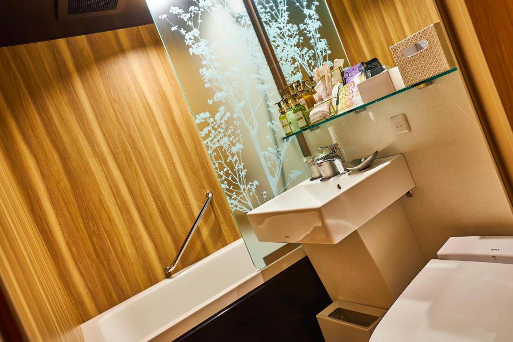 Koupelna v ubytování Hotel BaliAn Resort Shinjuku Glamping