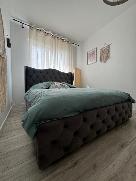 Ένα ή περισσότερα κρεβάτια σε δωμάτιο στο Apartament Kiekrz