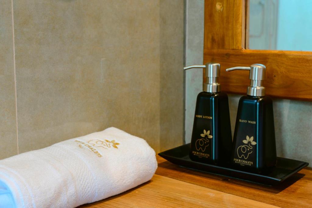 Postel nebo postele na pokoji v ubytování Four Chalets Yala