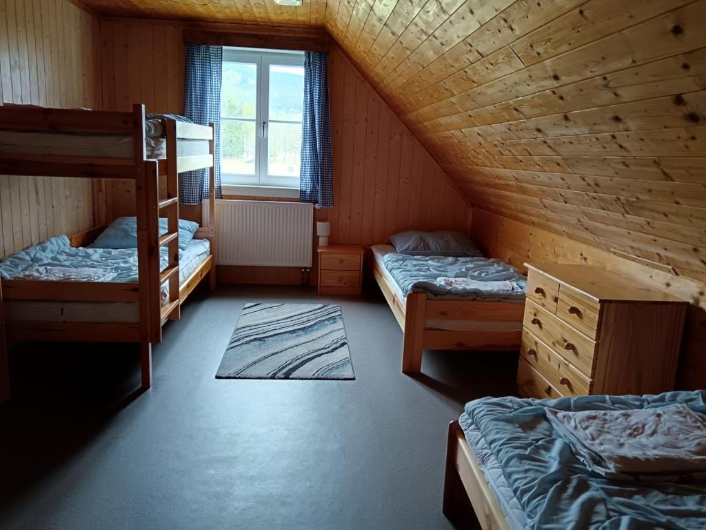 Postel nebo postele na pokoji v ubytování Chalupa Jadrná 2