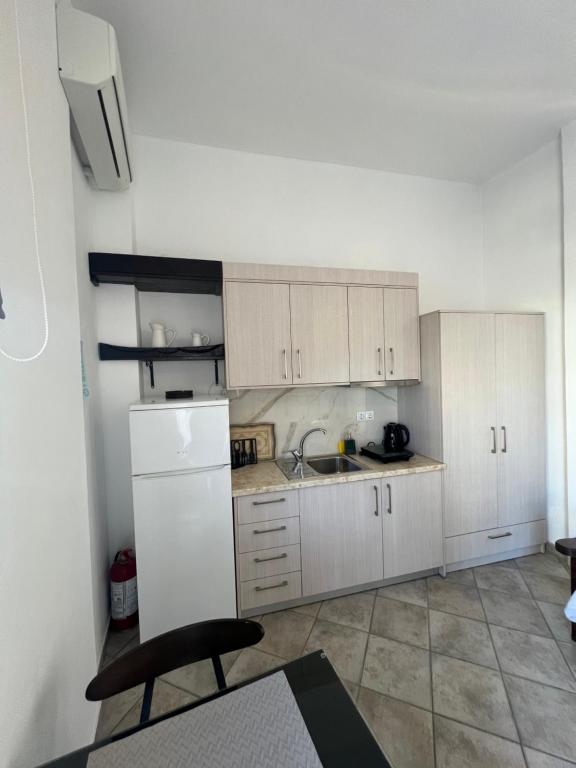 Kuchyň nebo kuchyňský kout v ubytování Xanthi Apartments