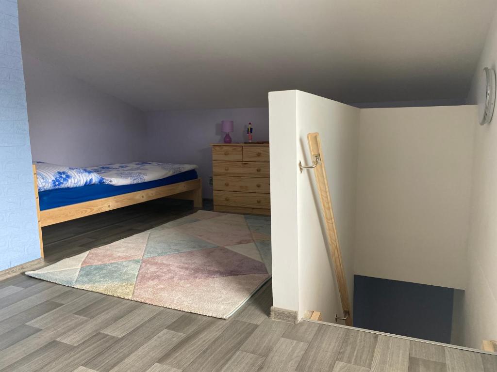 Łóżko lub łóżka w pokoju w obiekcie Apartmány U Jeřábků
