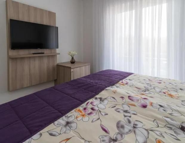 Voodi või voodid majutusasutuse Rooms & Apartment Mama Mia toas