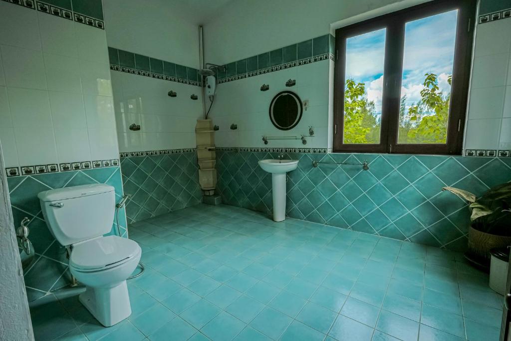 Koupelna v ubytování Banthi Home