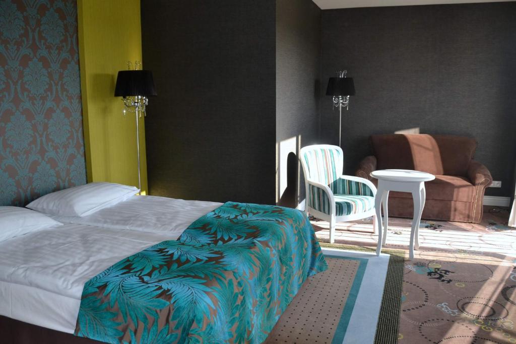 Postel nebo postele na pokoji v ubytování Hotel Lamberton