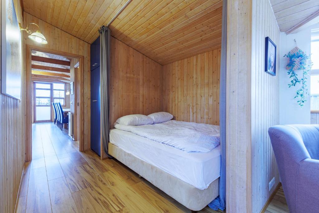 Postel nebo postele na pokoji v ubytování Cabin Úthlíð - Birta Rentals