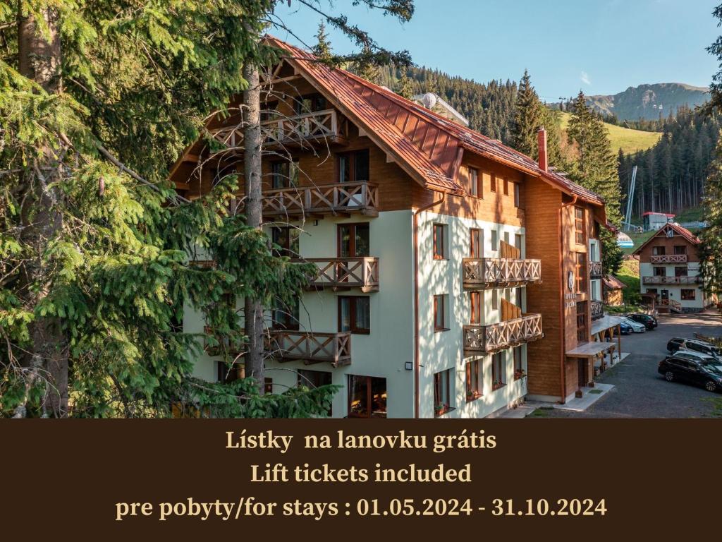 ein Plakat für ein Hotel in einem Resort in der Unterkunft Hotel Jasná in Demänovská Dolina