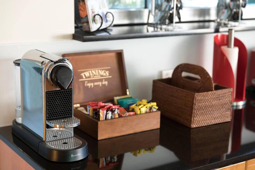 a counter with a hair dryer and a box of toys at Pavillions 17 Waterfront with Private Pool and Buggy in Hamilton Island