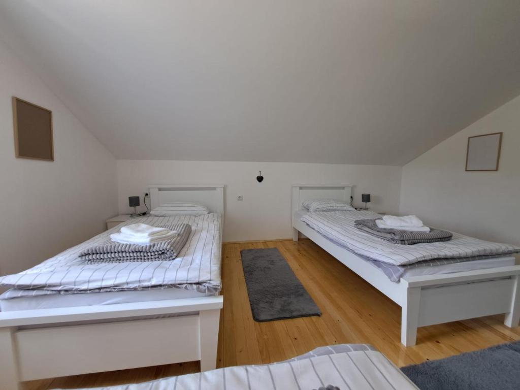 Postel nebo postele na pokoji v ubytování Sobe Žiži