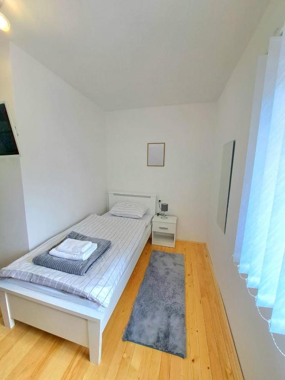 Postel nebo postele na pokoji v ubytování Sobe Žiži