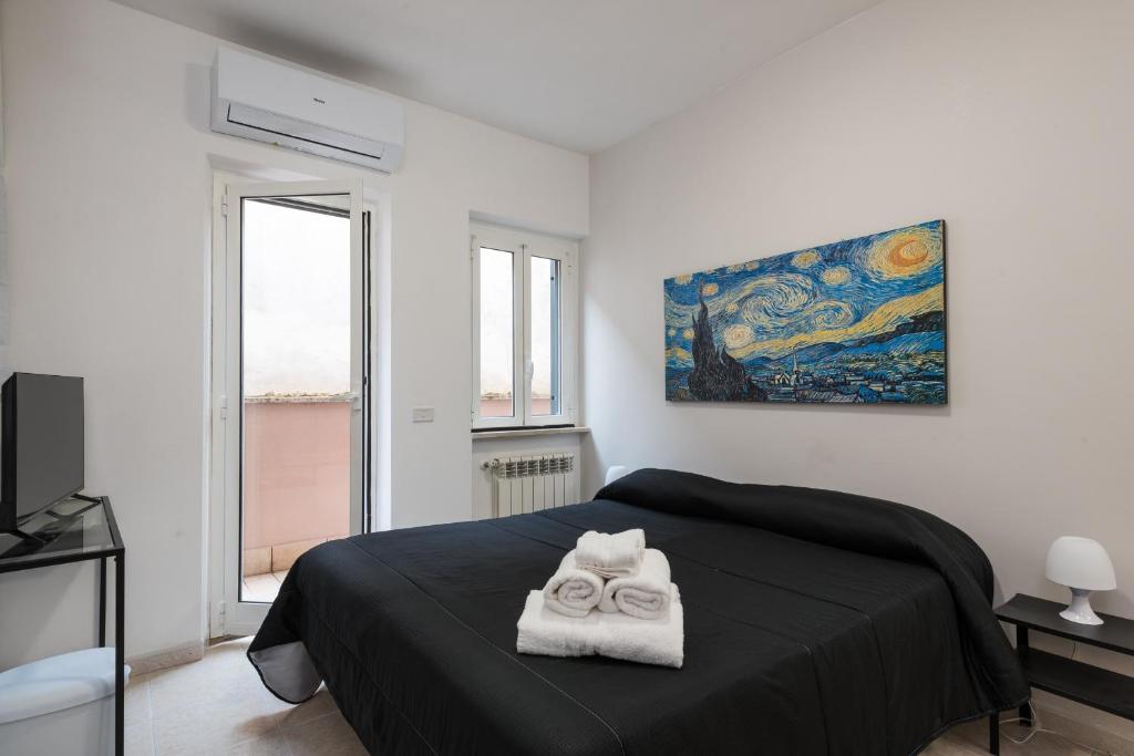Кровать или кровати в номере Travelershome Ciampino 170 Station Street