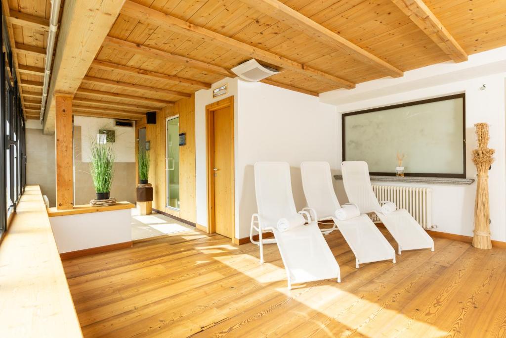 TV a/nebo společenská místnost v ubytování Hotel Cardo