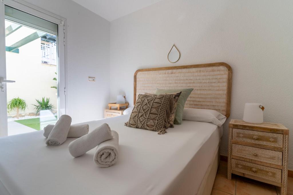 Postel nebo postele na pokoji v ubytování Villa Mimosas