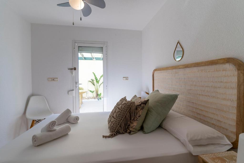 Postel nebo postele na pokoji v ubytování Villa Mimosas