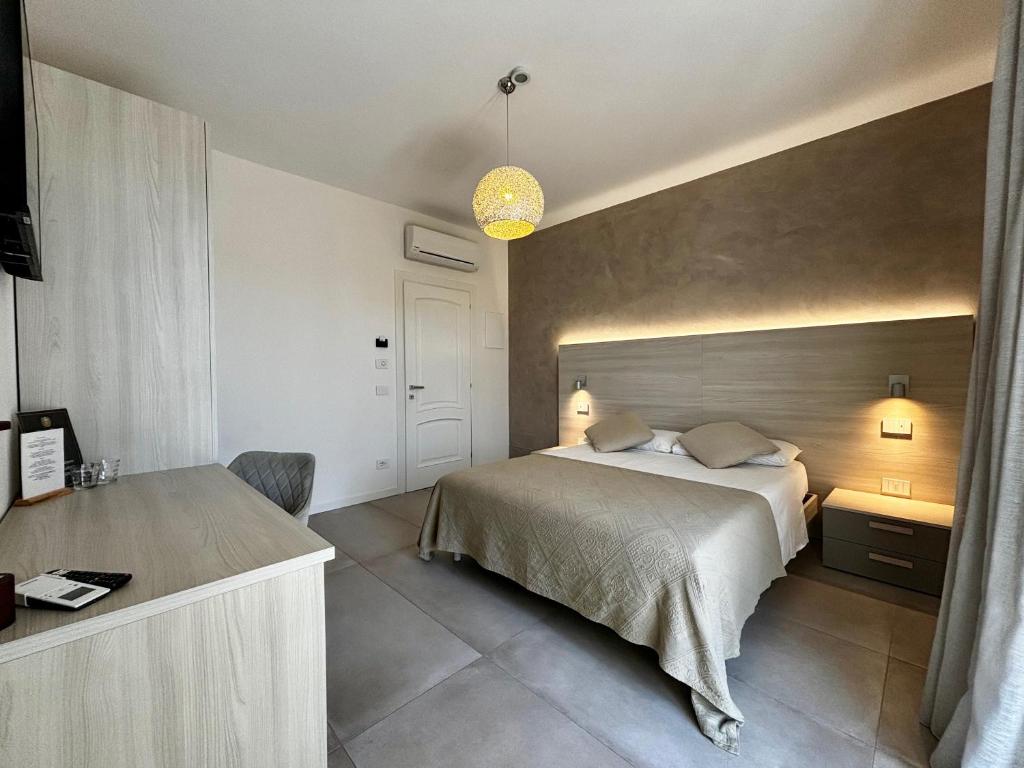 Postel nebo postele na pokoji v ubytování Villa Elena