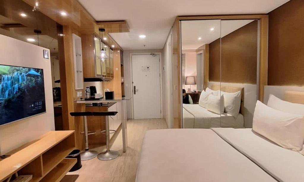 Swiss-Belcourt Serpong - 豪华大号床一室公寓