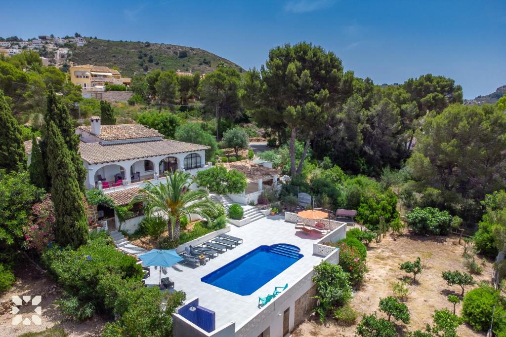an aerial view of a house with a swimming pool at Villa Corasol by Abahana Villas in Teulada