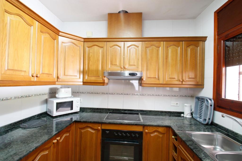 Kuchyň nebo kuchyňský kout v ubytování Villa Rustical 9