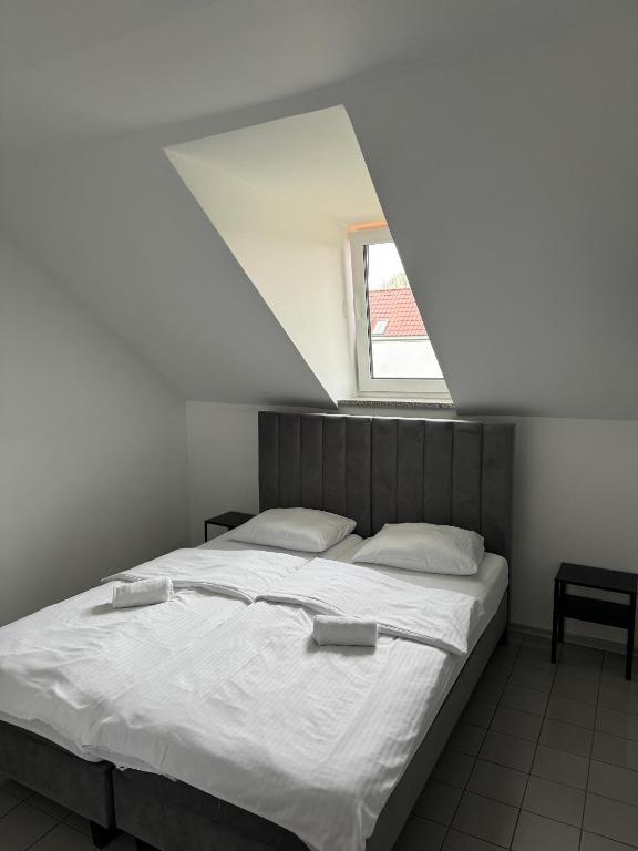 Posteľ alebo postele v izbe v ubytovaní Hotelik Maria