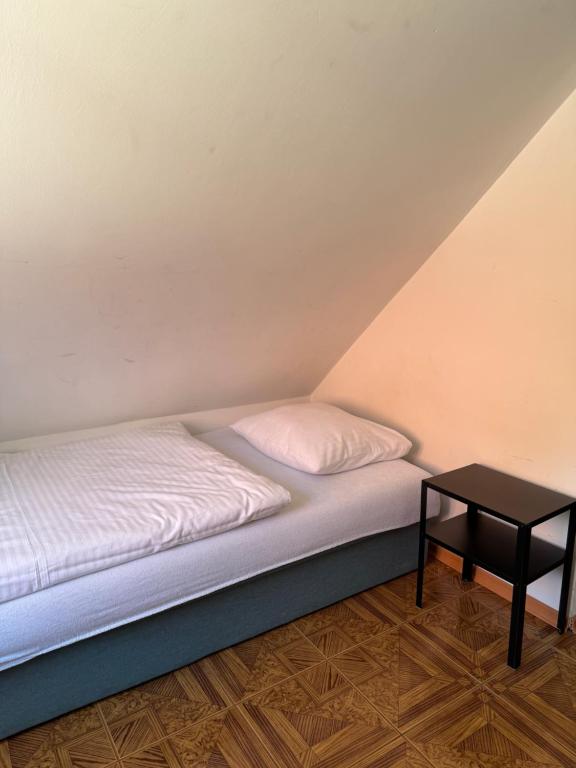 Posteľ alebo postele v izbe v ubytovaní Hotelik Maria