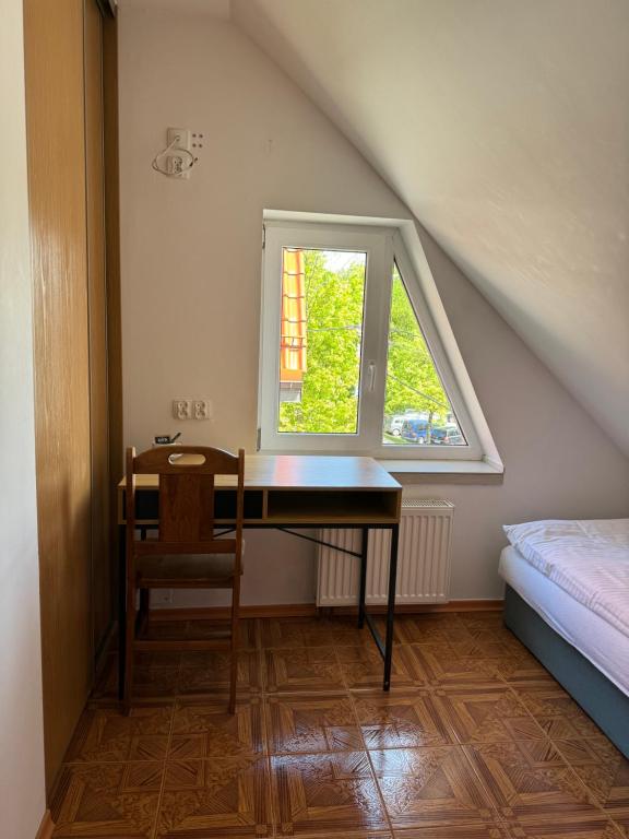 Posteľ alebo postele v izbe v ubytovaní Hotelik Maria