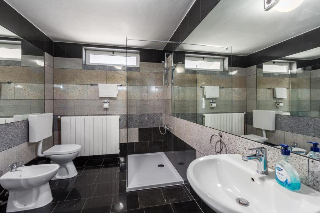 Kúpeľňa v ubytovaní Bellavista Superior Funtana