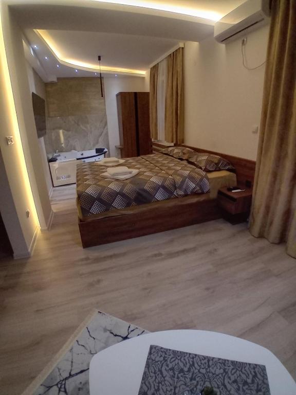Postel nebo postele na pokoji v ubytování Aqua Apartments 2