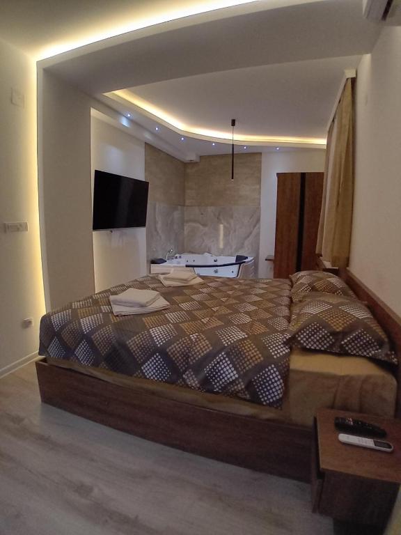 Postel nebo postele na pokoji v ubytování Aqua Apartments 2