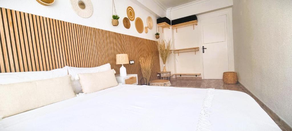 Katil atau katil-katil dalam bilik di WABI BEACH LUXURY HOUSE - Excelente Ubicacion!! Centro y Frente a Playa Colonia con Aire