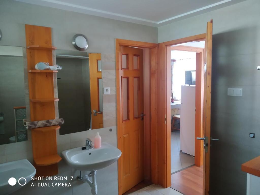 Kúpeľňa v ubytovaní Aranyhal apartman