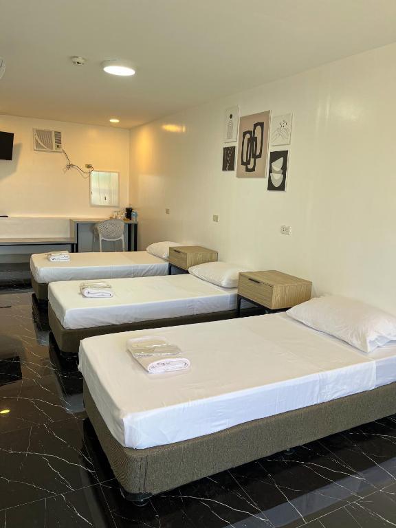 Postel nebo postele na pokoji v ubytování MAMORI HOTEL