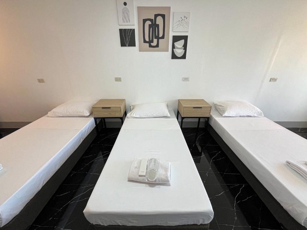 Postel nebo postele na pokoji v ubytování MAMORI HOTEL