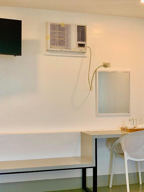 TV a/nebo společenská místnost v ubytování MAMORI HOTEL