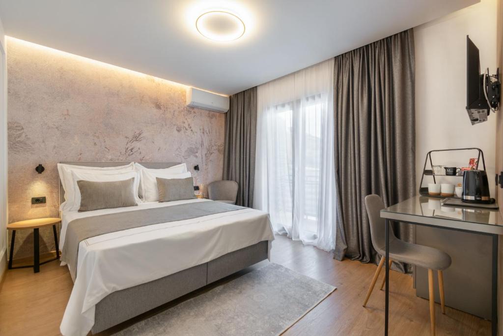 Llit o llits en una habitació de Guesthouse Čivljak