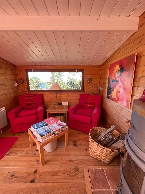 Posezení v ubytování Chalet des Myrtilles - chalet cosy avec vue