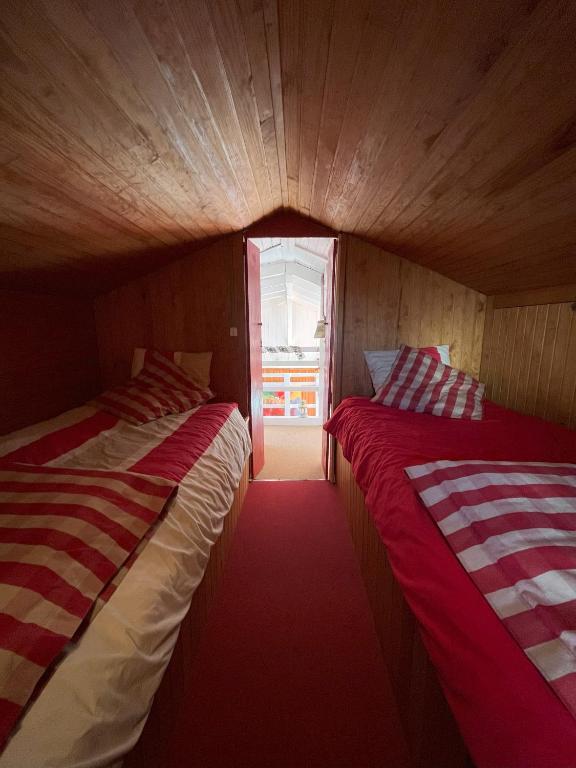 Postel nebo postele na pokoji v ubytování Chalet des Myrtilles - chalet cosy avec vue