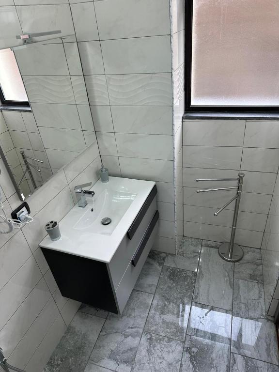 Koupelna v ubytování Testa House