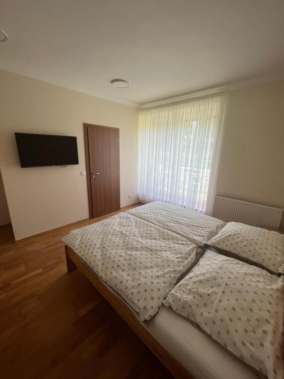 Letto o letti in una camera di Vila pri kúpeľoch