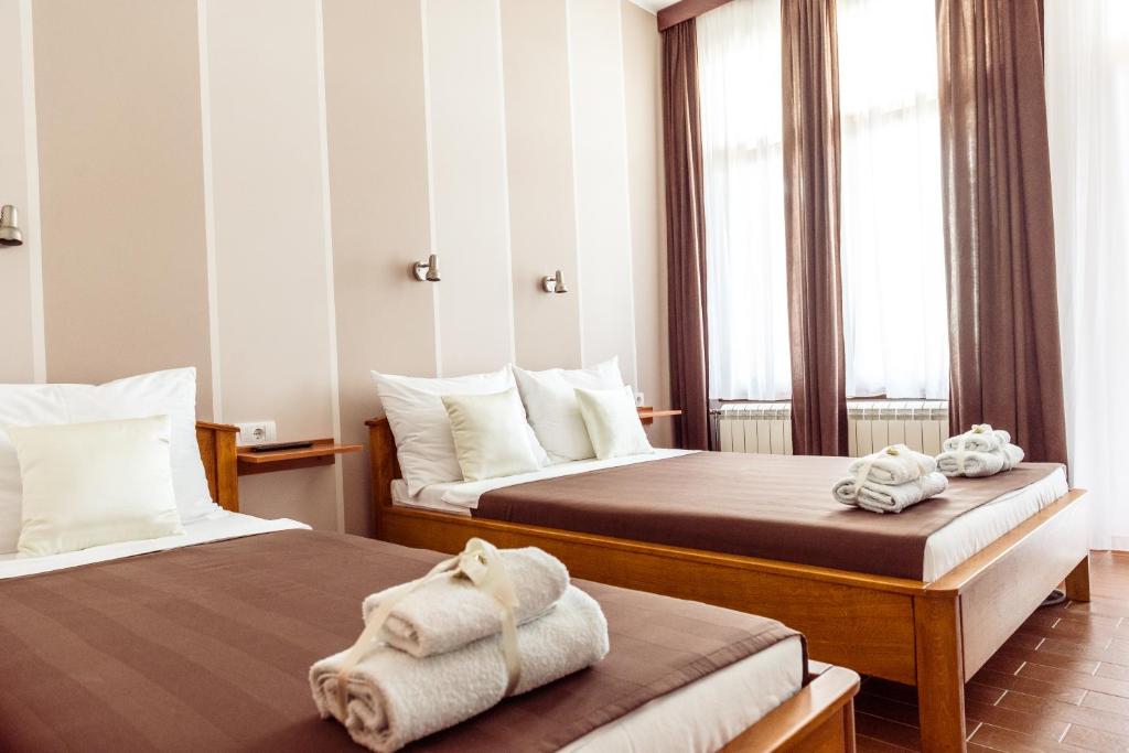 Postel nebo postele na pokoji v ubytování Posejdon Resort