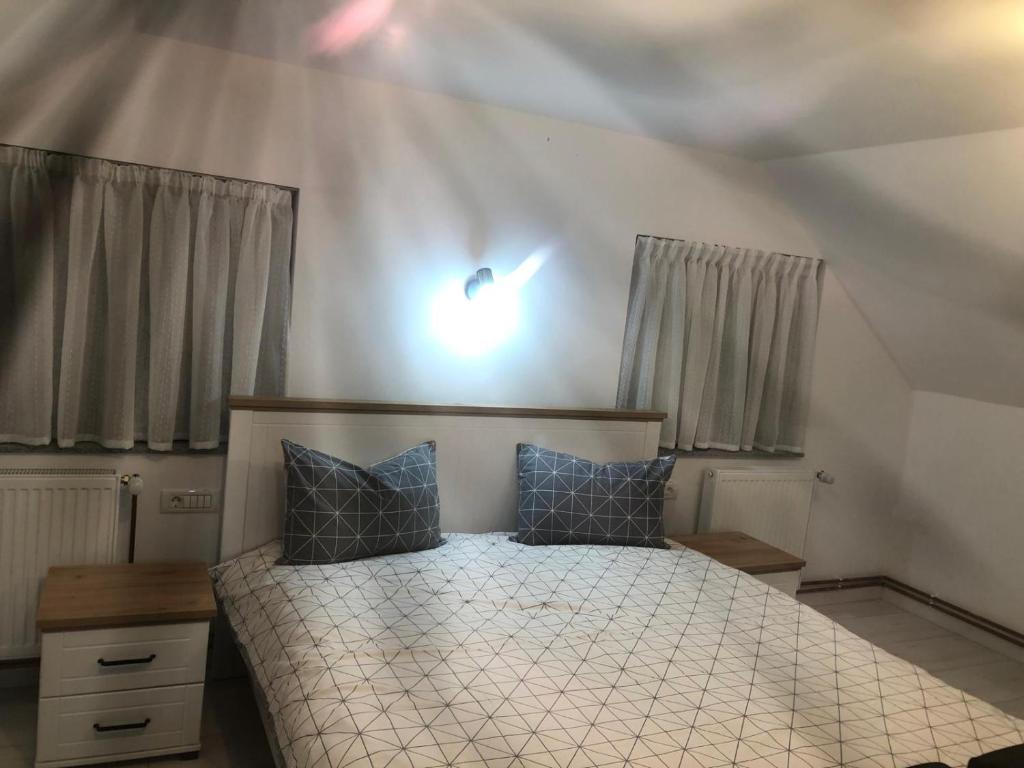 Postel nebo postele na pokoji v ubytování Casa de vacanta