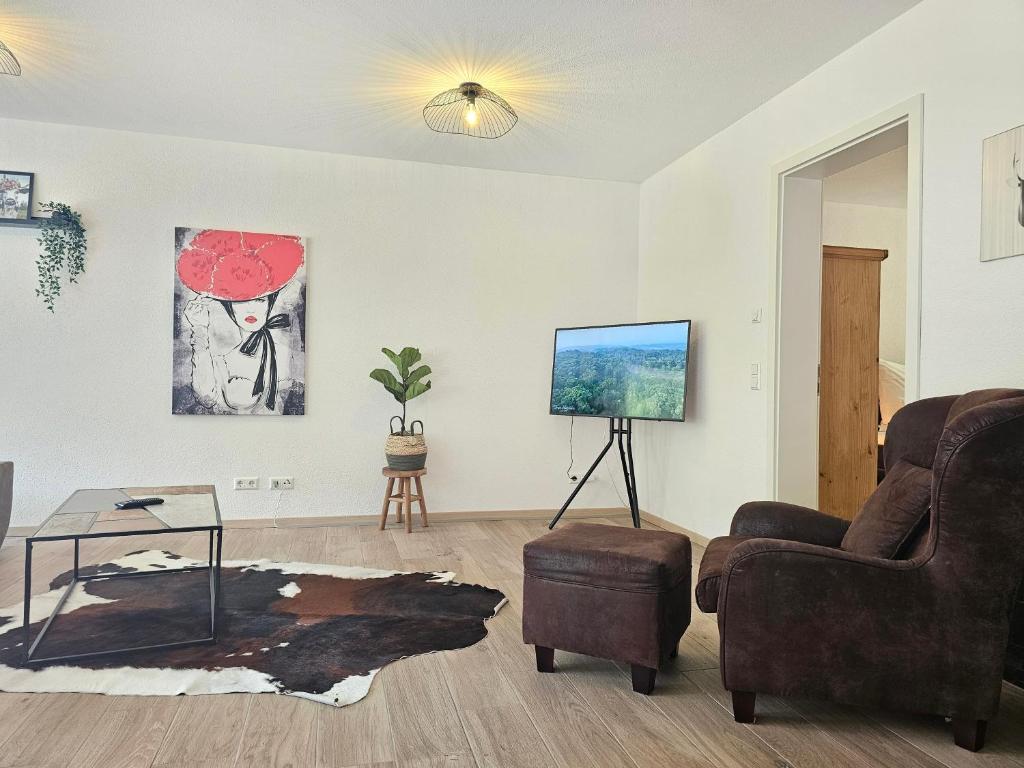TV a/nebo společenská místnost v ubytování Black Forest II Sauna I Boxspring I Nespresso I Ausblick I Wasserfälle im Ort